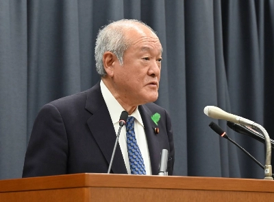 Finance Minister Shunichi Suzuki speaks to reporters in Tokyo on Tuesday. Finance Minister Shunichi Suzuki speaks to reporters in Tokyo on Tuesday.