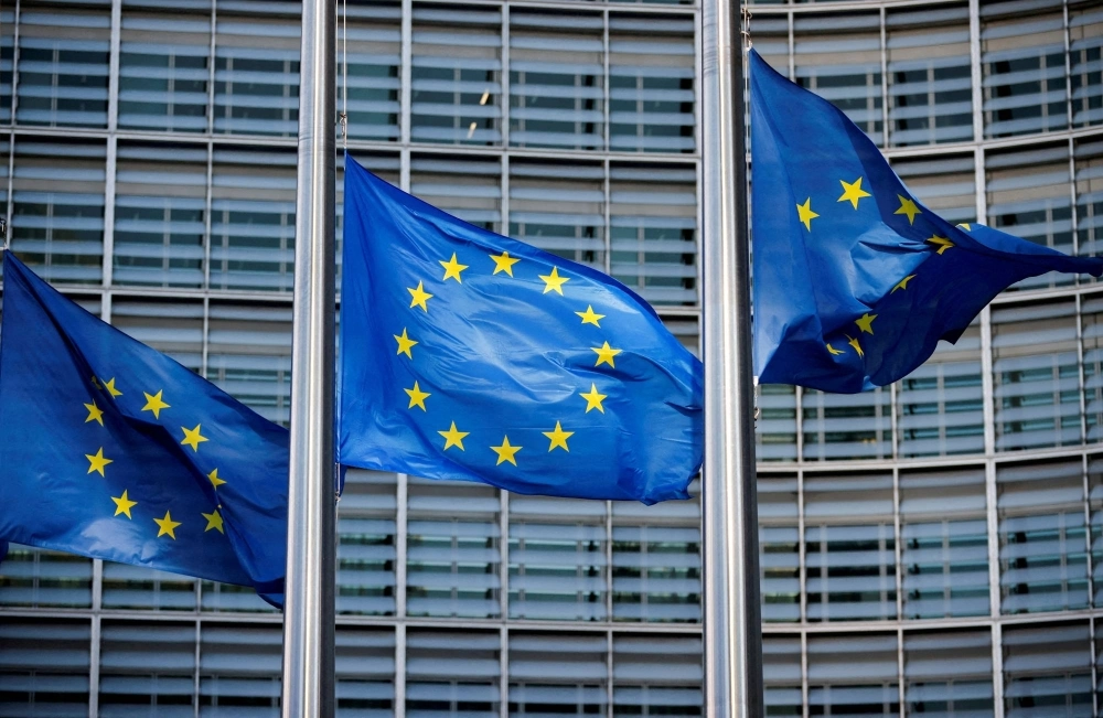 European Union flags fly outside the European Commission headquarters in Brussels. European Union flags fly outside the European Commission headquarters in Brussels.