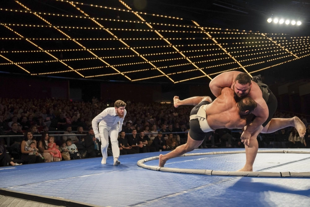 Rui "The Hurricane" Junior (right) takes down Mohamed Kamal during the World Championship Sumo tournament at Madison Square Garden in New York on April 13. Rui "The Hurricane" Junior (right) takes down Mohamed Kamal during the World Championship Sumo tournament at Madison Square Garden in New York on April 13.