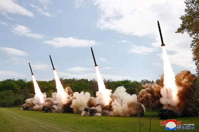 Missiles are launched during a simulated nuclear counterattack drill at an undisclosed location in North Korea in this image released Tuesday. Missiles are launched during a simulated nuclear counterattack drill at an undisclosed location in North Korea in this image released Tuesday.