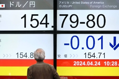 An electronic board in Tokyo showing the yen-dollar rate on Wednesday An electronic board in Tokyo showing the yen-dollar rate on Wednesday