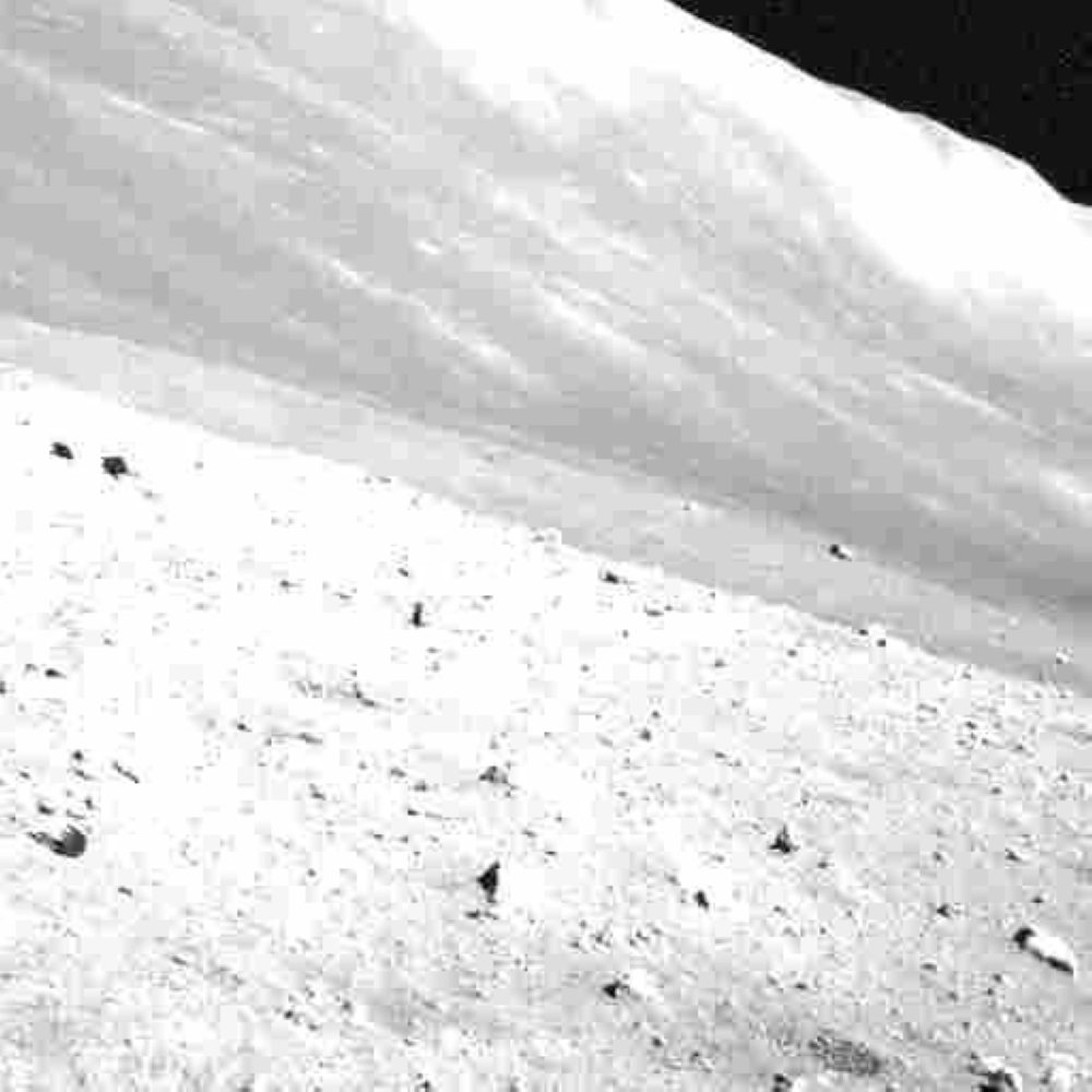An image of the lunar surface taken Tuesday by Japan's moon lander, which has survived three lunar nights An image of the lunar surface taken Tuesday by Japan's moon lander, which has survived three lunar nights