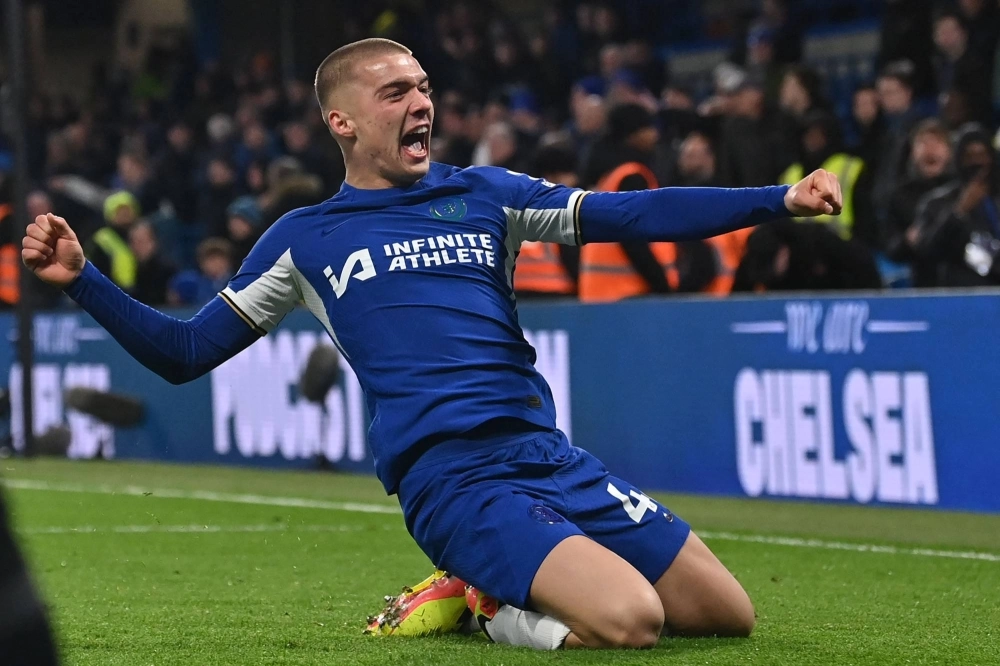 Chelsea defender Alfie Gilchrist celebrates after scoring the club's sixth goal during their English Premier League football match against Everton on April 15. Chelsea defender Alfie Gilchrist celebrates after scoring the club's sixth goal during their English Premier League football match against Everton on April 15.