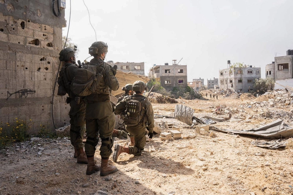 This Israeli Army handout released on April 18 shows Israeli soldiers conducting operations in the Gaza Strip against Hamas militants.  This Israeli Army handout released on April 18 shows Israeli soldiers conducting operations in the Gaza Strip against Hamas militants.