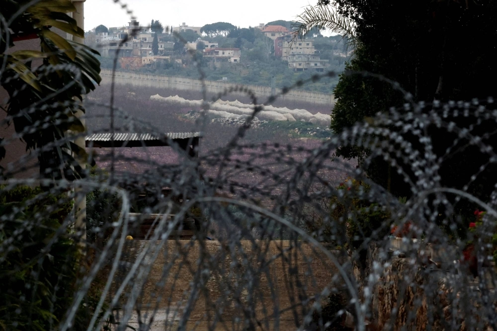 Razor wire lies near an abandoned house, amid ongoing cross-border hostilities between Hezbollah and Israeli forces, near Israel’s border with Lebanon in northern Israel on March 19. Razor wire lies near an abandoned house, amid ongoing cross-border hostilities between Hezbollah and Israeli forces, near Israel’s border with Lebanon in northern Israel on March 19.