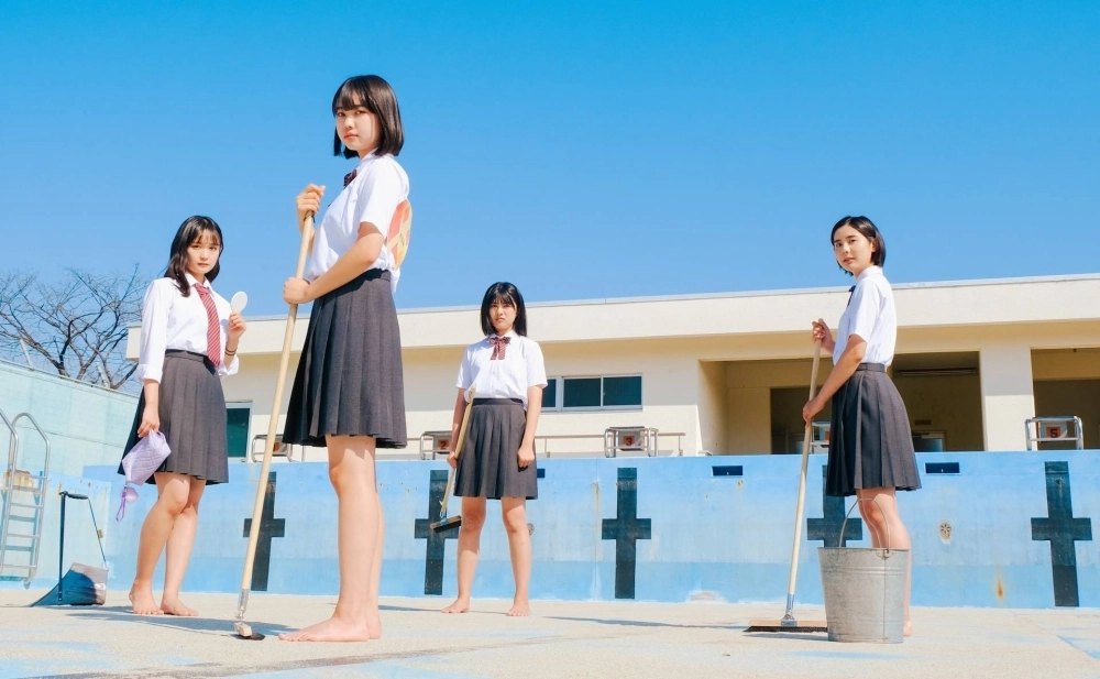 Four girls congregate at an empty swimming pool at their high school and discuss their lives in “Swimming in a Sand Pool.” Four girls congregate at an empty swimming pool at their high school and discuss their lives in “Swimming in a Sand Pool.”