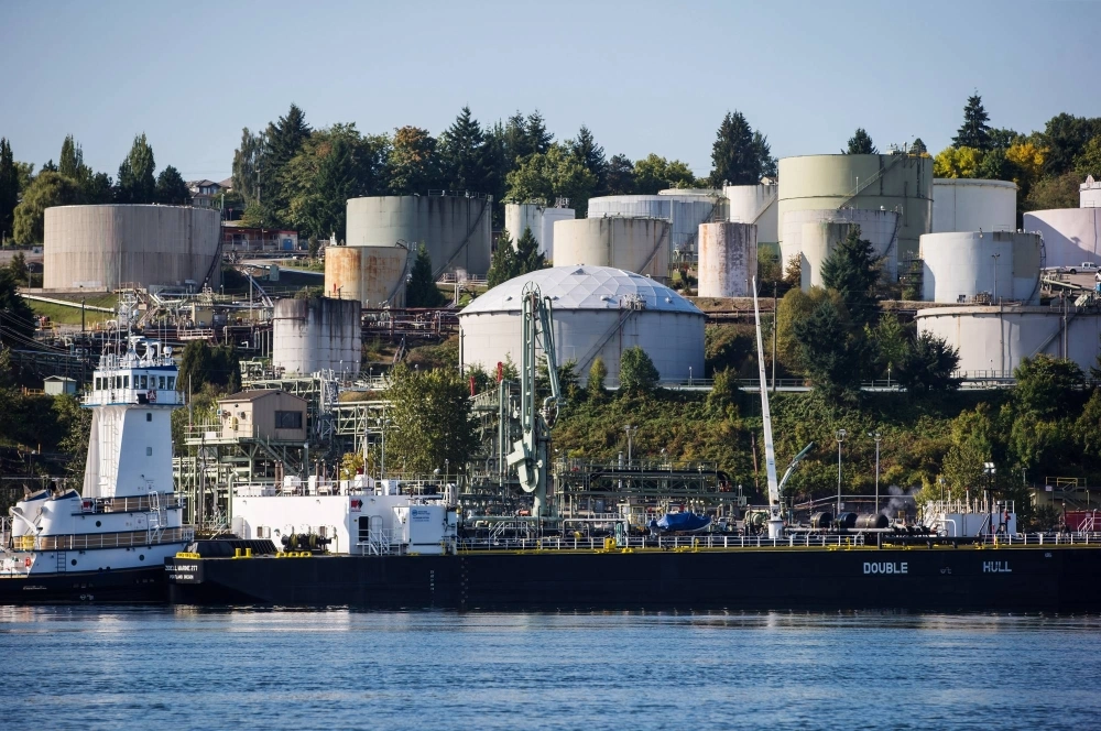 A double-hulled tanker sits docked in front of the Burnaby Refinery, near Vancouver. Natural gas is a key component of the city’s energy use. A double-hulled tanker sits docked in front of the Burnaby Refinery, near Vancouver. Natural gas is a key component of the city’s energy use.