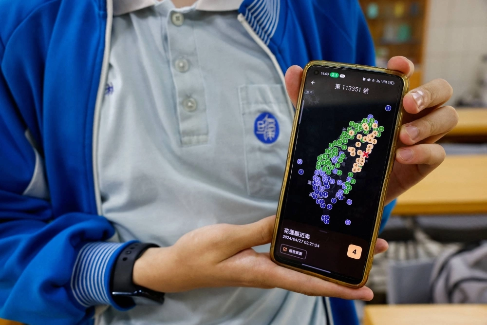 Lin Ruei, 17, co-founder of Exptech and Disaster Prevention Information Platform app (DPIP), poses for a photo in Taoyuan, Taiwan, on April 29. Lin Ruei, 17, co-founder of Exptech and Disaster Prevention Information Platform app (DPIP), poses for a photo in Taoyuan, Taiwan, on April 29.