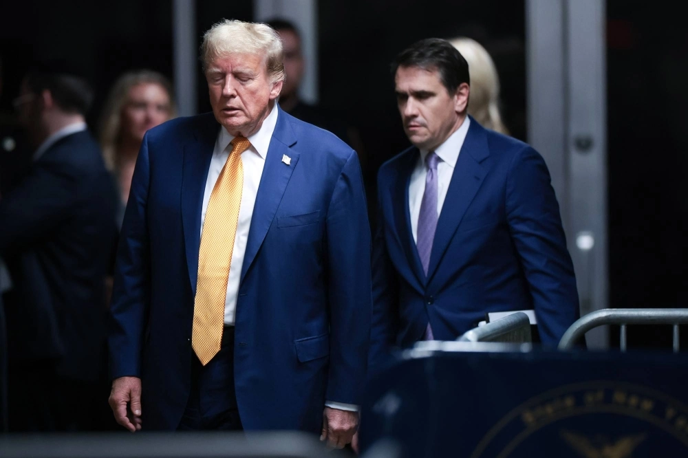 Former U.S. President Donald Trump and his attorney, Todd Blanche, at Manhattan criminal court in New York on Tuesday. Trump faces 34 felony counts of falsifying business records as part of an alleged scheme to silence claims of extramarital sexual encounters during his 2016 presidential campaign. Former U.S. President Donald Trump and his attorney, Todd Blanche, at Manhattan criminal court in New York on Tuesday. Trump faces 34 felony counts of falsifying business records as part of an alleged scheme to silence claims of extramarital sexual encounters during his 2016 presidential campaign.