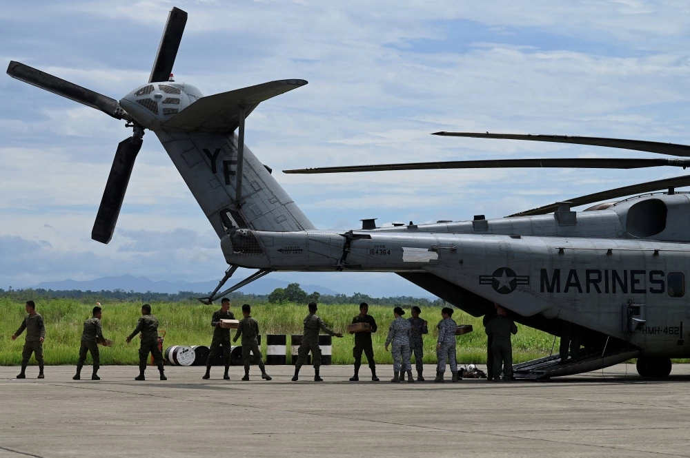 Soldiers load boxes of relief goods into a U.S. CH53 Sea Stallion aircraft at Lal-lo Airport in Cagayan province, northern Philippines, last August. The Lal-lo Airport is one of the additional sites for the Enhanced Defense Cooperation Agreement (EDCA) between the Philippines and the United States. Soldiers load boxes of relief goods into a U.S. CH53 Sea Stallion aircraft at Lal-lo Airport in Cagayan province, northern Philippines, last August. The Lal-lo Airport is one of the additional sites for the Enhanced Defense Cooperation Agreement (EDCA) between the Philippines and the United States.