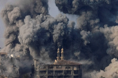 Smoke billows following Israeli strikes on the Islamic University of Gaza (IUG) on October 11, 2023. Smoke billows following Israeli strikes on the Islamic University of Gaza (IUG) on October 11, 2023.