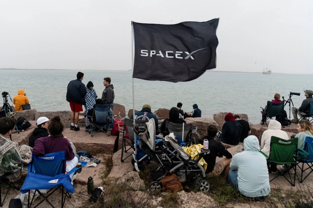 Spectators gather on South Padre Island to watch the planned launch of SpaceX's next-generation Starship spacecraft from the company's Boca Chica launchpad, near Brownsville, Texas, on March 14. Spectators gather on South Padre Island to watch the planned launch of SpaceX's next-generation Starship spacecraft from the company's Boca Chica launchpad, near Brownsville, Texas, on March 14.