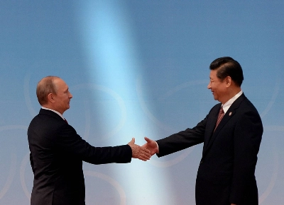 Russian President Vladimir Putin is greeted by Chinese leader Xi Jinping before the opening ceremony at the Expo Center at the fourth Conference on Interaction and Confidence Building Measures in Asia summit in Shanghai in May 2014. Russian President Vladimir Putin is greeted by Chinese leader Xi Jinping before the opening ceremony at the Expo Center at the fourth Conference on Interaction and Confidence Building Measures in Asia summit in Shanghai in May 2014.