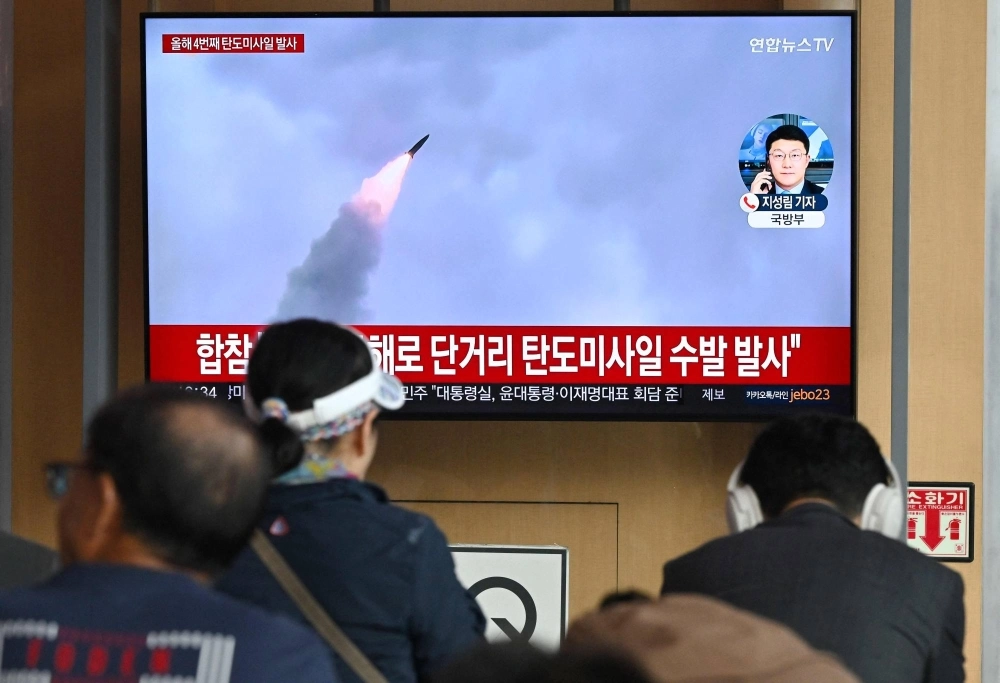 A news broadcast on a screen at a Seoul railway station shows file footage of a past North Korean missile test. A news broadcast on a screen at a Seoul railway station shows file footage of a past North Korean missile test.