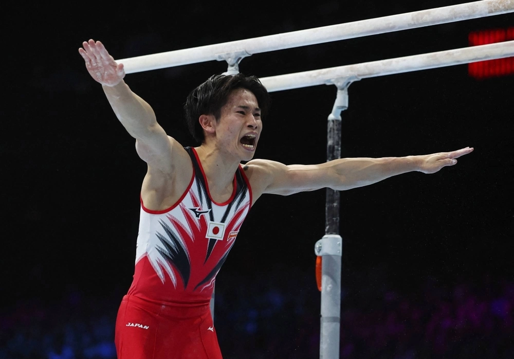 Kazuma Kaya reacts after his routine on the parallel bars during the men's apparatus finals at the 2023 World Artistic Gymnastics Championships in Antwerp on Oct. 8. Kazuma Kaya reacts after his routine on the parallel bars during the men's apparatus finals at the 2023 World Artistic Gymnastics Championships in Antwerp on Oct. 8.