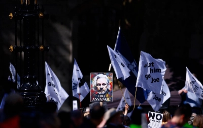 Supporters of WikiLeaks founder Julian Assange protest outside The Royal Courts of Justice, Britain's High Court, in central London on Monday. Supporters of WikiLeaks founder Julian Assange protest outside The Royal Courts of Justice, Britain's High Court, in central London on Monday.