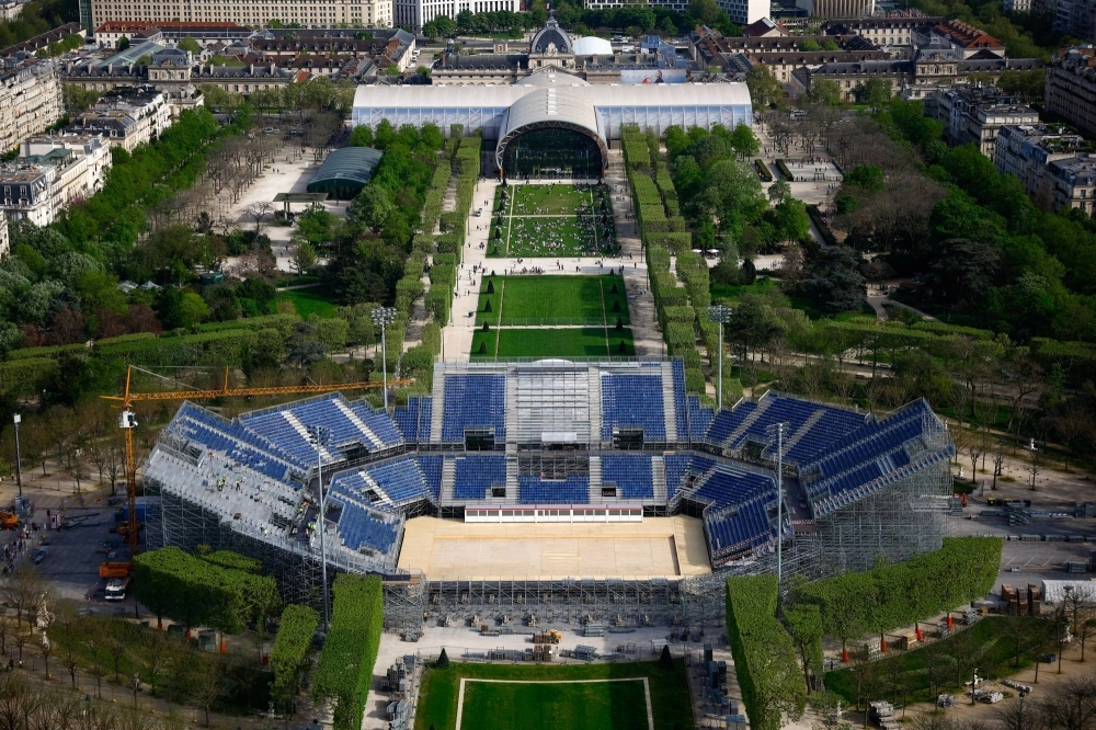 The Eiffel Tower Stadium, under construction for the Paris 2024 Olympic and Paralympic Games, and the Champ-de-Mars Arena in Paris on April 13 The Eiffel Tower Stadium, under construction for the Paris 2024 Olympic and Paralympic Games, and the Champ-de-Mars Arena in Paris on April 13