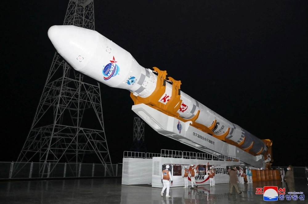 A North Korean rocket carrying a spy satellite is prepared for launch in a location given as North Gyeongsang province in this image released on Nov. 21. A North Korean rocket carrying a spy satellite is prepared for launch in a location given as North Gyeongsang province in this image released on Nov. 21.