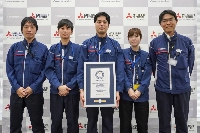 The Mitsubishi Electric project team poses with their Guinness World Records certificate in Hyogo Prefecture. | Courtesy of Mitsubishi Electric