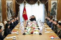 North Korean leader Kim Jong Un attends a meeting of the country's Politburo at an undisclosed location on Friday. | KCNA VIA KNS / AFP-JIJI