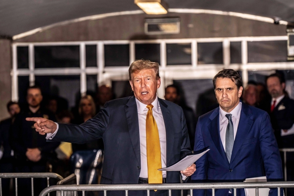Trump speaks to members of the media at Manhattan criminal court in New York on May 21.  Trump speaks to members of the media at Manhattan criminal court in New York on May 21.