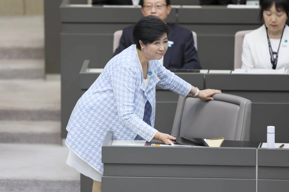 Tokyo Gov. Yuriko Koike attends the Tokyo Metropolitan Assembly on Wednesday. Koike, who is coming to the end of her second term as governor, did not formally announce her intent to run for July's gubernatorial election on Wednesday despite indications that she might. Tokyo Gov. Yuriko Koike attends the Tokyo Metropolitan Assembly on Wednesday. Koike, who is coming to the end of her second term as governor, did not formally announce her intent to run for July's gubernatorial election on Wednesday despite indications that she might.