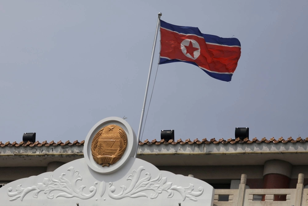 The North Korean flag flutters at the North Korea consular office in Dandong, China, in 2021. The North Korean flag flutters at the North Korea consular office in Dandong, China, in 2021.