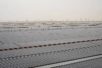 Arrays of solar panels that help power the Jazlah Water Desalination plant, reducing carbon dioxide emissions, in Jubail, Saudi Arabia, on March 4 | Iman AlDabbagh / The New York Times