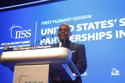 U.S. Secretary of Defense Lloyd Austin speaks during the IISS Shangri-La Dialogue in Singapore on Saturday. U.S. Secretary of Defense Lloyd Austin speaks during the IISS Shangri-La Dialogue in Singapore on Saturday.