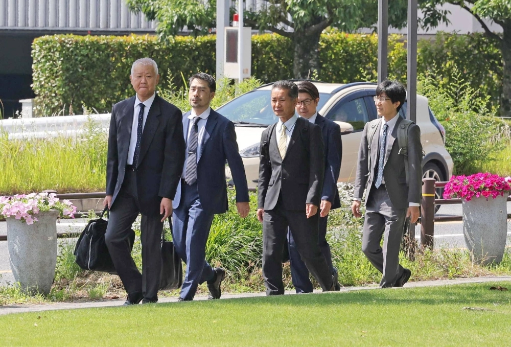 Transport ministry officials head to Toyota's headquarters in Aichi Prefecture on Tuesday for on-site inspections. Transport ministry officials head to Toyota's headquarters in Aichi Prefecture on Tuesday for on-site inspections.