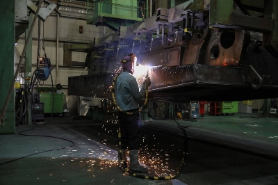 A welder works on a K9 Howitzer at Hanwha Aerospace’s manufacturing facility in Changwon, South Korea. A welder works on a K9 Howitzer at Hanwha Aerospace’s manufacturing facility in Changwon, South Korea.