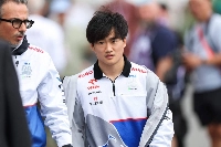 RB's Yuki Tsunoda arrives at the circuit Saturday ahead of qualifying for the Canadian Grand Prix in Montreal. | AFP-JIJI
