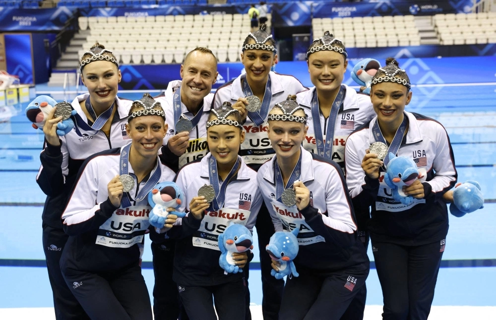 Bill May (rear, second from left) poses with the rest of the U.S. team after earning silver at the World Aquatics Championships in Fukuoka on July 17, 2023. Bill May (rear, second from left) poses with the rest of the U.S. team after earning silver at the World Aquatics Championships in Fukuoka on July 17, 2023.