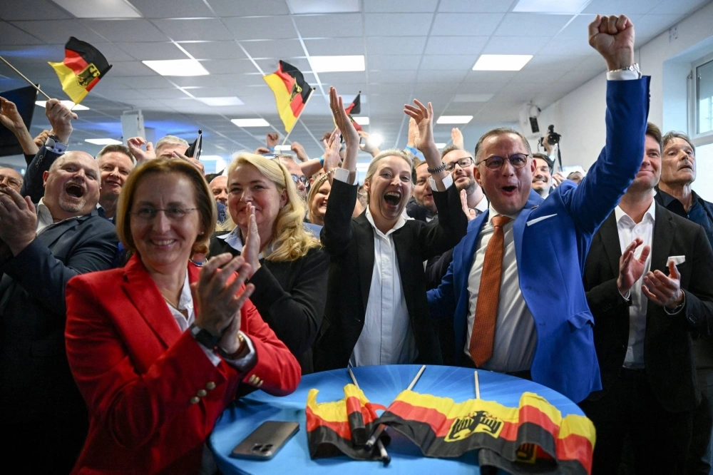 Alternative for Germany party co-leaders Alice Weidel and Tino Chrupalla react to results after the polls closed in the European Parliament elections, in Berlin on Sunday. Alternative for Germany party co-leaders Alice Weidel and Tino Chrupalla react to results after the polls closed in the European Parliament elections, in Berlin on Sunday.