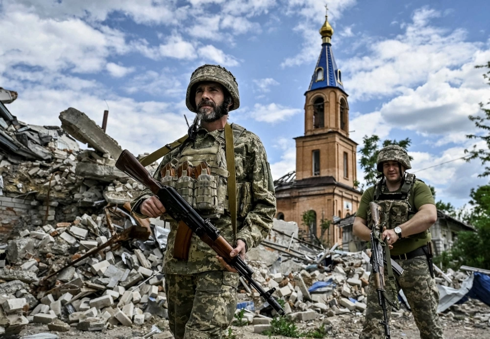 Ukrainian servicemen patrol in the heavily damaged town of Orikhiv in the Zaporizhzhia region of Ukraine on May 20. It is time to stop wondering what is on Vladimir Putin’s mind and start making him fear a potential Western response to his aggression.  Ukrainian servicemen patrol in the heavily damaged town of Orikhiv in the Zaporizhzhia region of Ukraine on May 20. It is time to stop wondering what is on Vladimir Putin’s mind and start making him fear a potential Western response to his aggression.