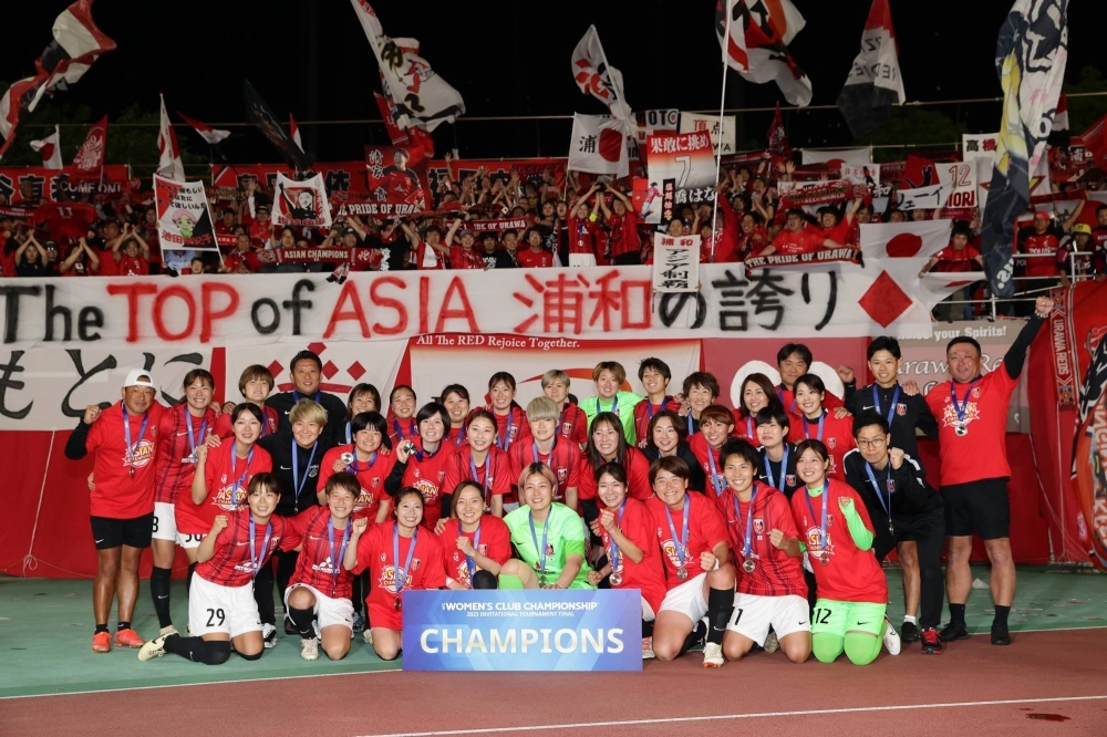 Urawa Reds Ladies celebrate winning the Asian club title last month over South Korean side Hyundai Steel Red Angels.  Urawa Reds Ladies celebrate winning the Asian club title last month over South Korean side Hyundai Steel Red Angels.