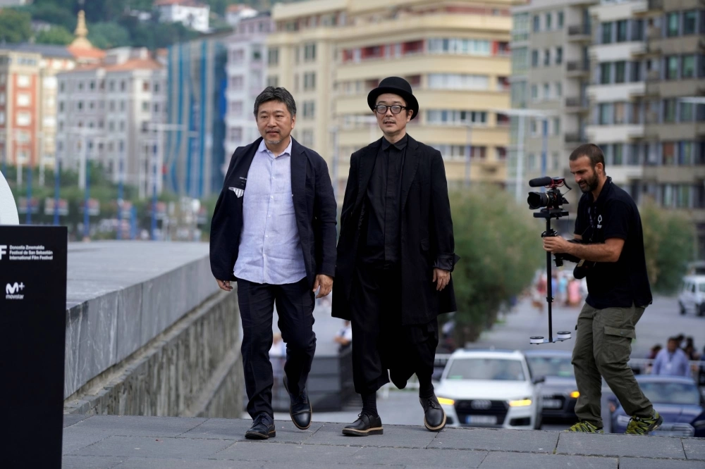 Film director Hirokazu Kore-eda (left) and actor Lily Franky arrive for a photocall to promote the Official Selection feature film "Shoplifters" at the San Sebastian Film Festival in Spain in September 2018. Film director Hirokazu Kore-eda (left) and actor Lily Franky arrive for a photocall to promote the Official Selection feature film "Shoplifters" at the San Sebastian Film Festival in Spain in September 2018.