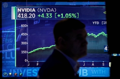 A screen tracks Nvidia's stock price movements as a trader works on the floor at the New York Stock Exchange on Oct. 23, 2023. A screen tracks Nvidia's stock price movements as a trader works on the floor at the New York Stock Exchange on Oct. 23, 2023.