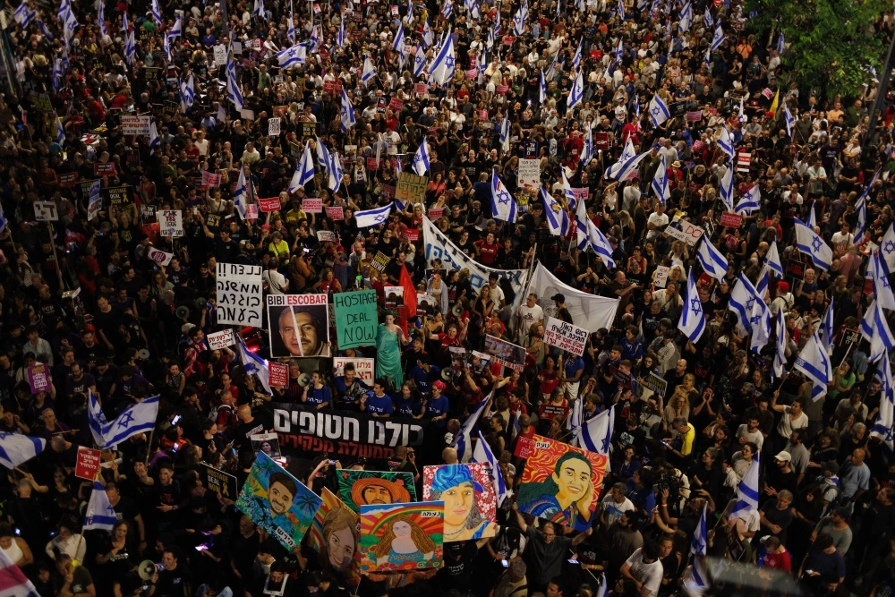 Israelis protest for the release of hostages held in Gaza and against the government in Tel Aviv on June 1. Israelis protest for the release of hostages held in Gaza and against the government in Tel Aviv on June 1.