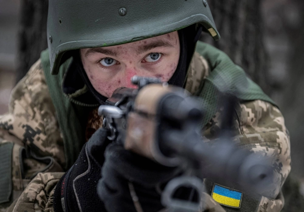 A volunteer hoping to join the 3rd Separate Assault Brigade of the Ukrainian Armed Forces attends basic training at an undisclosed location in the Kyiv region, Ukraine, on Jan. 9. A volunteer hoping to join the 3rd Separate Assault Brigade of the Ukrainian Armed Forces attends basic training at an undisclosed location in the Kyiv region, Ukraine, on Jan. 9.