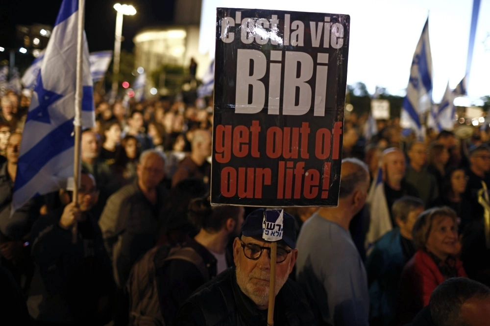An anti-government protest in Tel Aviv in January. In a TV interview on Sunday, Israeli Prime Minister Benjamin Netanyahu rejected the terms of a U.S.-led cease-fire deal and said he was prepared to open a second front against Hezbollah, in Lebanon. An anti-government protest in Tel Aviv in January. In a TV interview on Sunday, Israeli Prime Minister Benjamin Netanyahu rejected the terms of a U.S.-led cease-fire deal and said he was prepared to open a second front against Hezbollah, in Lebanon.