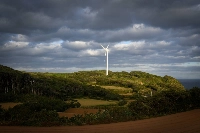 A wind turbine by the shore in Iki, Nagasaki Prefecture | Bloomberg