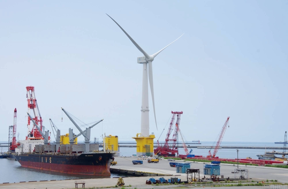 A floating wind turbine for an experimental offshore power generation project is unveiled at Onahama port in Iwaki, Fukushima Prefecture, in June 2015. A floating wind turbine for an experimental offshore power generation project is unveiled at Onahama port in Iwaki, Fukushima Prefecture, in June 2015.