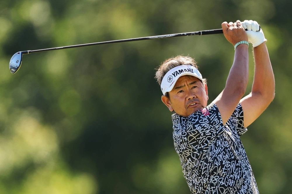 Hiroyuki Fujita hits a shot during the second round of the U.S. Senior Open Championship at Newport Country Club in Rhode Island on Friday.   Hiroyuki Fujita hits a shot during the second round of the U.S. Senior Open Championship at Newport Country Club in Rhode Island on Friday.