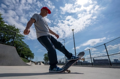 Japan skateboarding national team coach Daisuke Hayakawa performs at a skateboard training area in Tokyo on June 12. Japan skateboarding national team coach Daisuke Hayakawa performs at a skateboard training area in Tokyo on June 12.