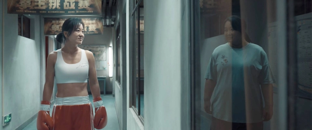 Leying (played by Jia Ling) hasn't been living up to her potential, but is pushed into a radical transformation by hitting rock bottom in the Chinese remake of a hit Japanese boxing drama in "YOLO." Leying (played by Jia Ling) hasn't been living up to her potential, but is pushed into a radical transformation by hitting rock bottom in the Chinese remake of a hit Japanese boxing drama in "YOLO."