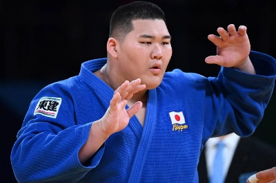 Japan's Tatsuru Saito competes during the 2022 world championship in Tashkent, Uzbekistan. 
 Japan's Tatsuru Saito competes during the 2022 world championship in Tashkent, Uzbekistan.