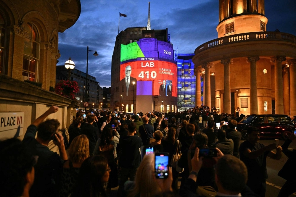 An exit poll predicting that the Labour Party led by Keir Starmer will win 410 seats in Britain's general election is projected onto BBC Broadcasting House in London on July 4, 2024. Labour is set for a landslide win in U.K. election, exit polls showed.  An exit poll predicting that the Labour Party led by Keir Starmer will win 410 seats in Britain's general election is projected onto BBC Broadcasting House in London on July 4, 2024. Labour is set for a landslide win in U.K. election, exit polls showed.