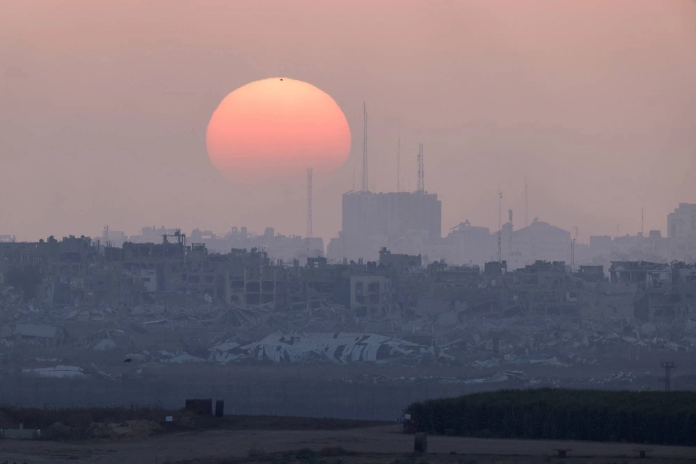 The sun sets over Gaza on Wednesday. The sun sets over Gaza on Wednesday.
