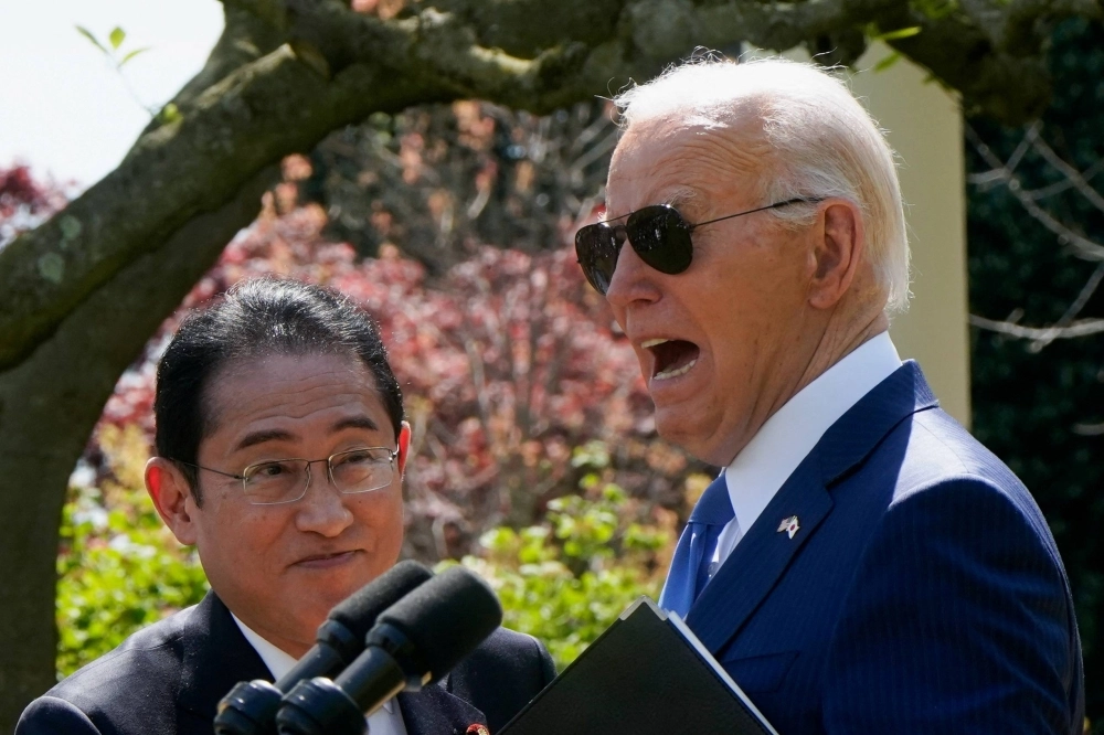 Prime Minister Fumio Kishida listens to U.S. President Joe Biden as they hold a joint news conference in the Rose Garden of the White House in Washington in April. Prime Minister Fumio Kishida listens to U.S. President Joe Biden as they hold a joint news conference in the Rose Garden of the White House in Washington in April.